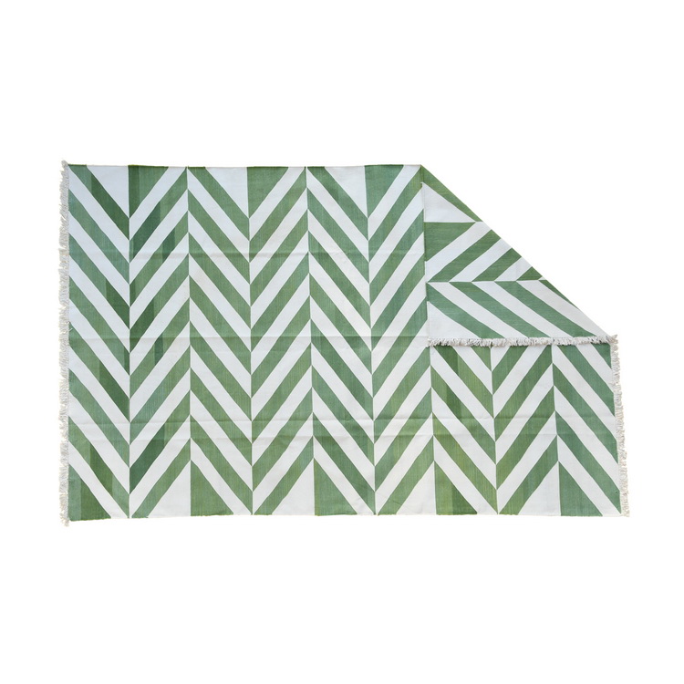 Geometric white and green rug