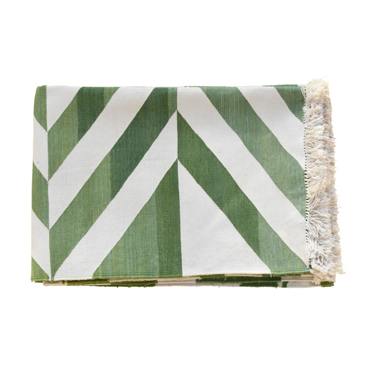 Geometric white and green rug