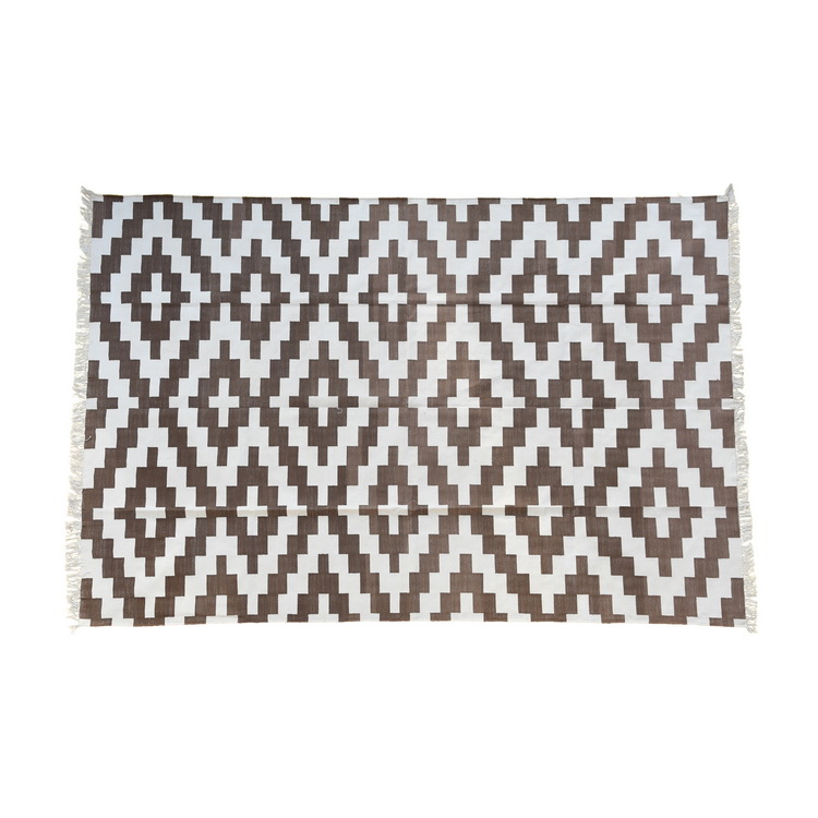 brown and white geometric rug