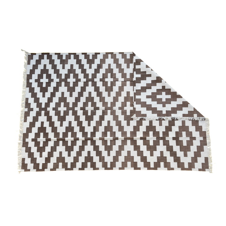 brown and white geometric rug