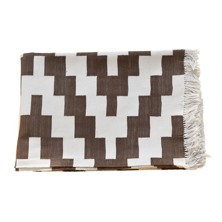 brown and white geometric rug