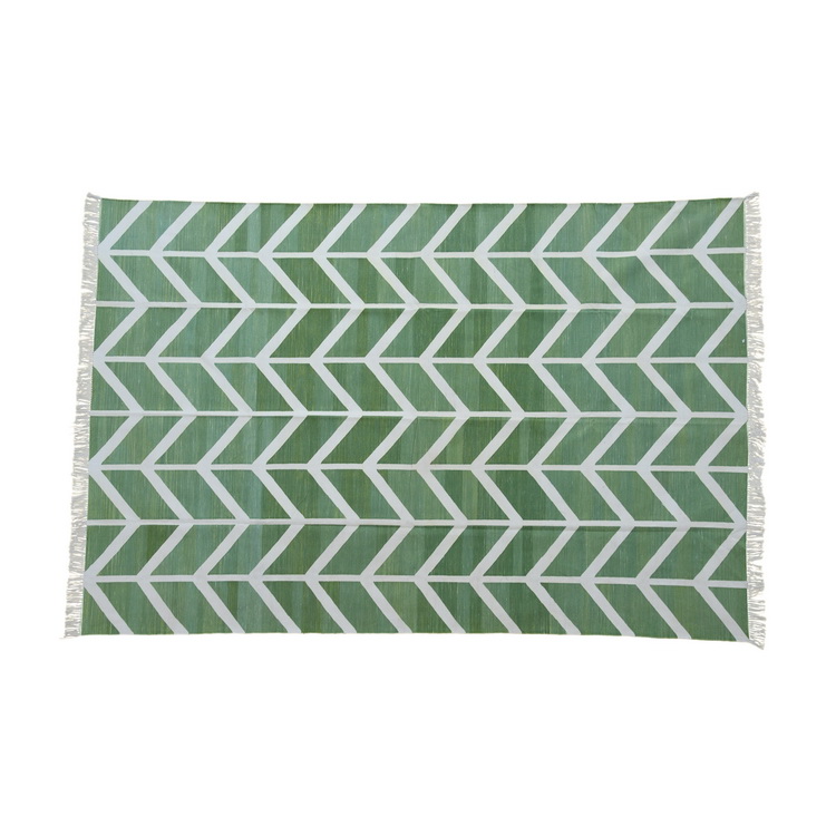 Geometric white and green rug