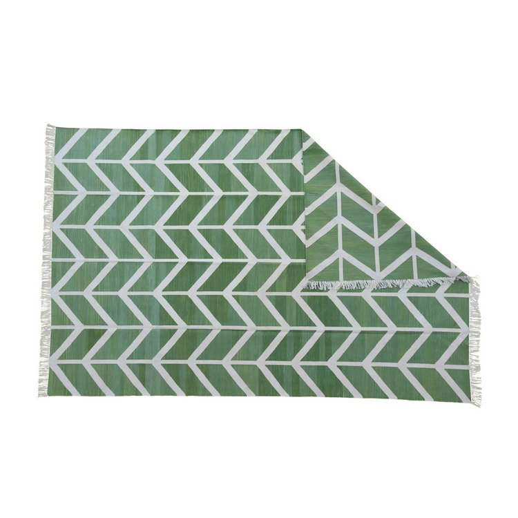 Geometric white and green rug