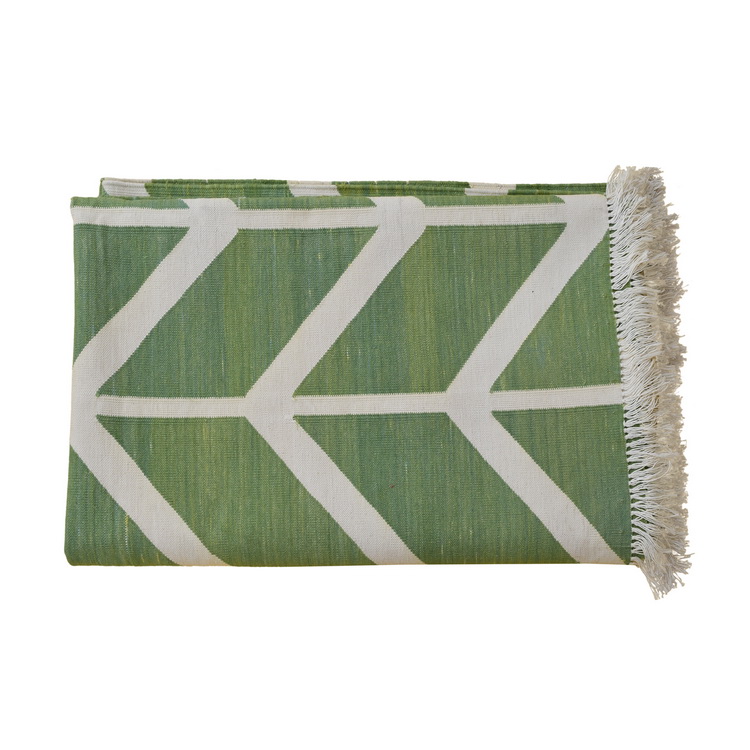 Geometric white and green rug