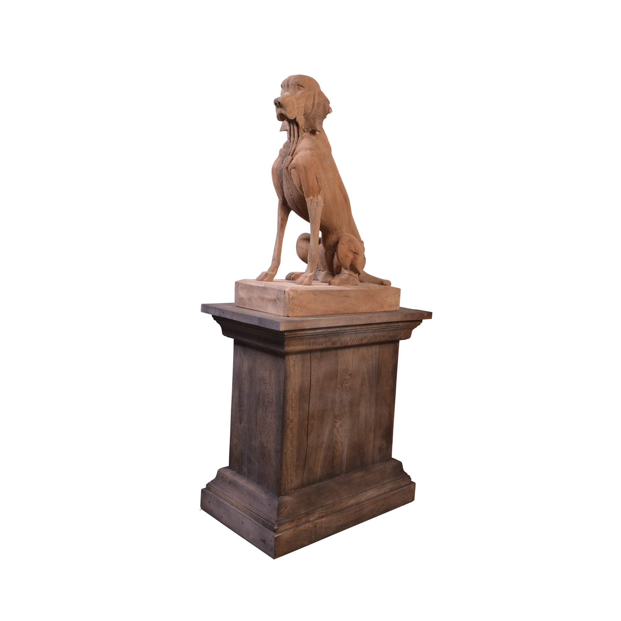 Wooden dog on pedestal