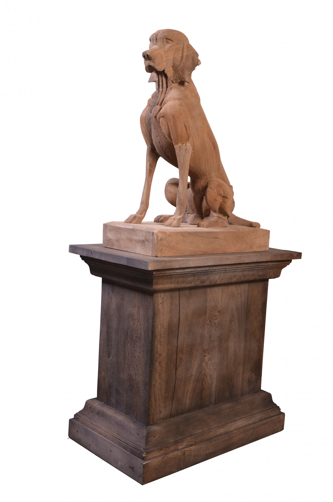 Wooden dog on pedestal
