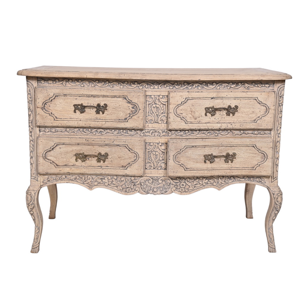Carved French chest of drawers