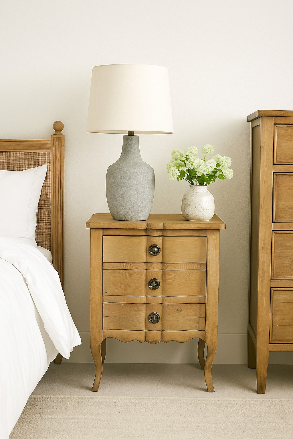 Quaint three drawer bedside table