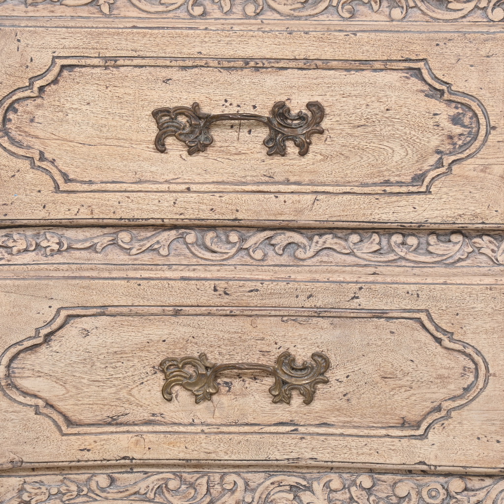 Carved French chest of drawers