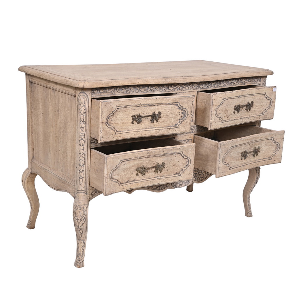 Carved French chest of drawers