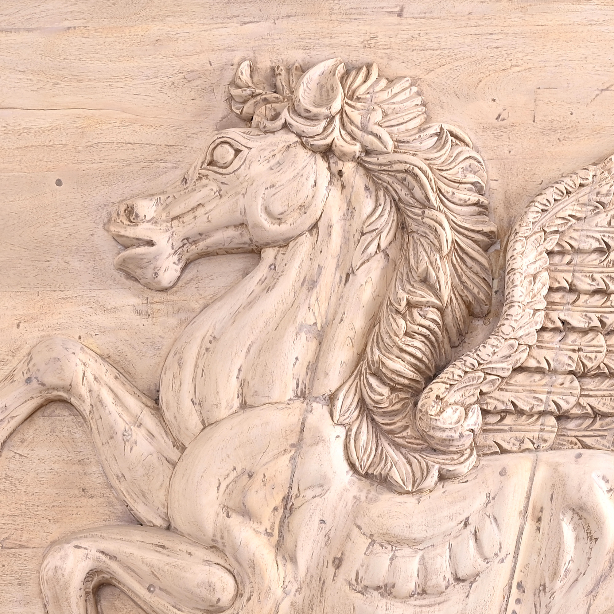 hand-carved wooden horse mural
