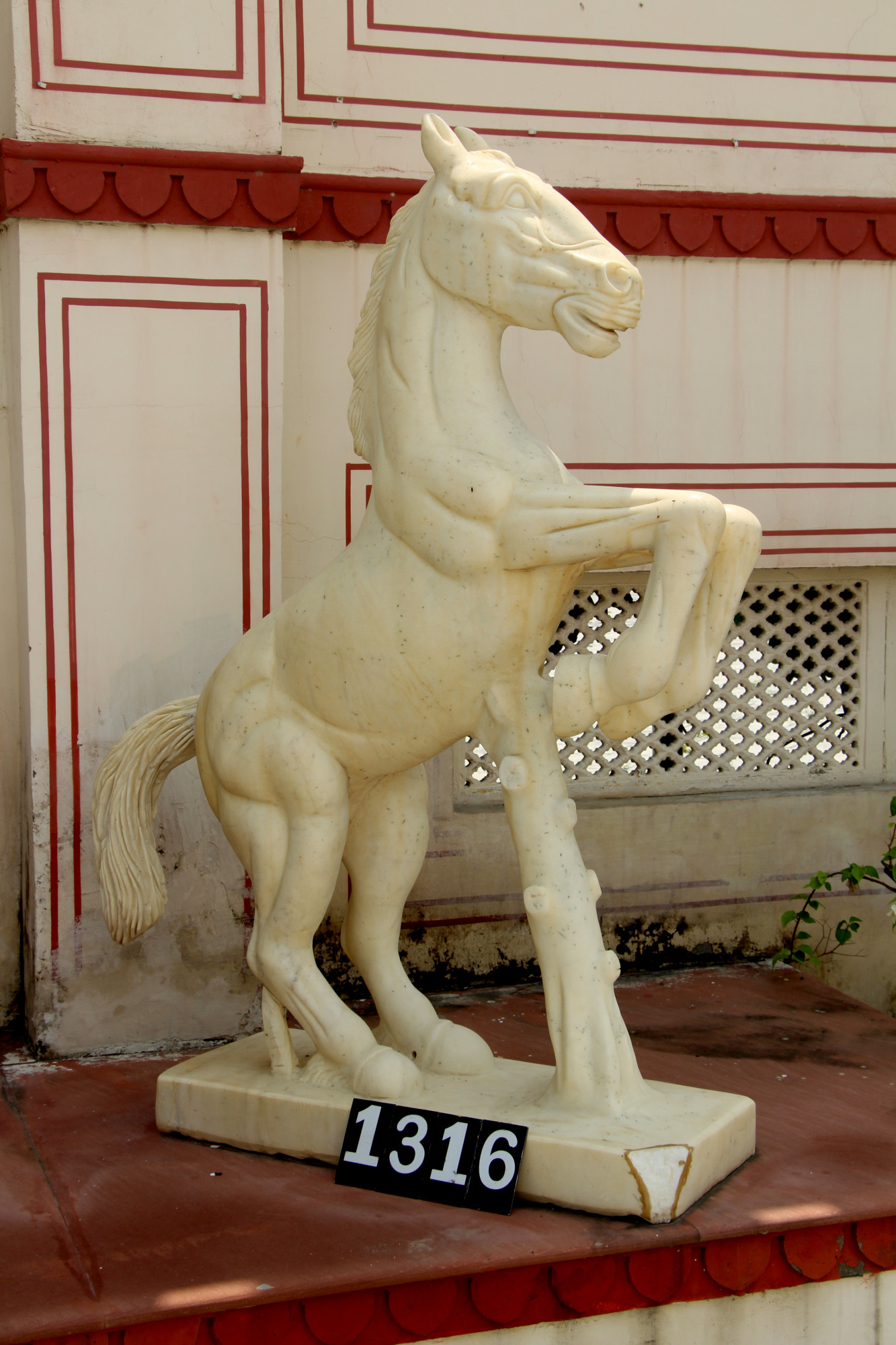 White marble galloping horse statue
