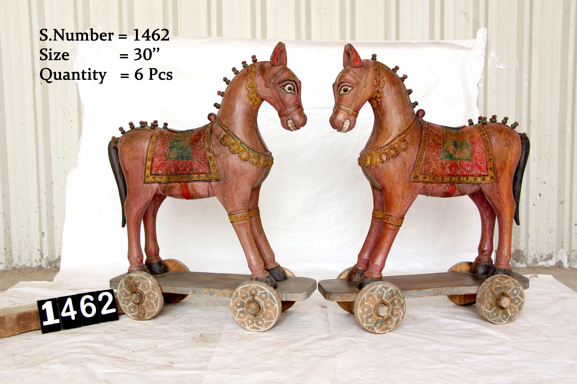 Vintage wooden horse on wheels
