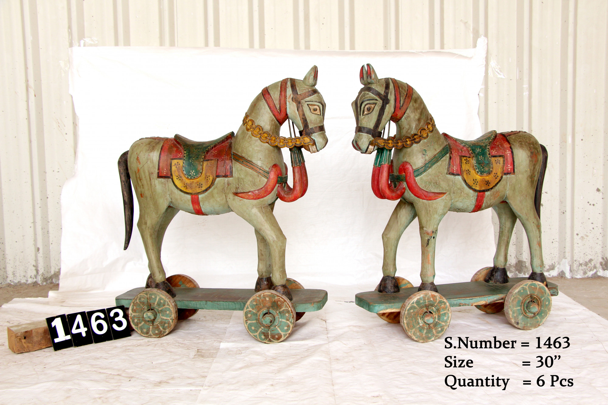 Vintage wooden horse on wheels