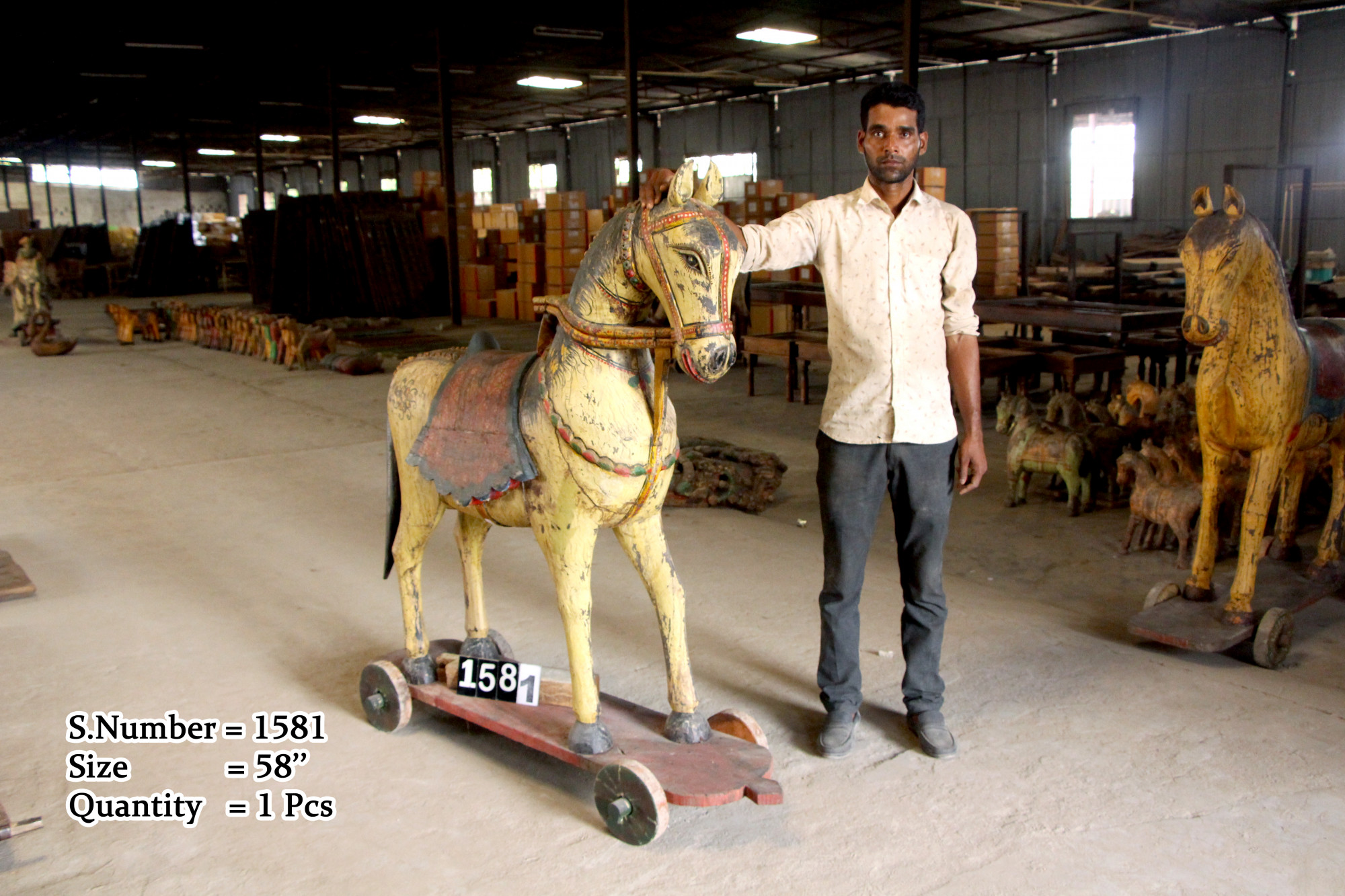 Vintage wooden horse on wheels