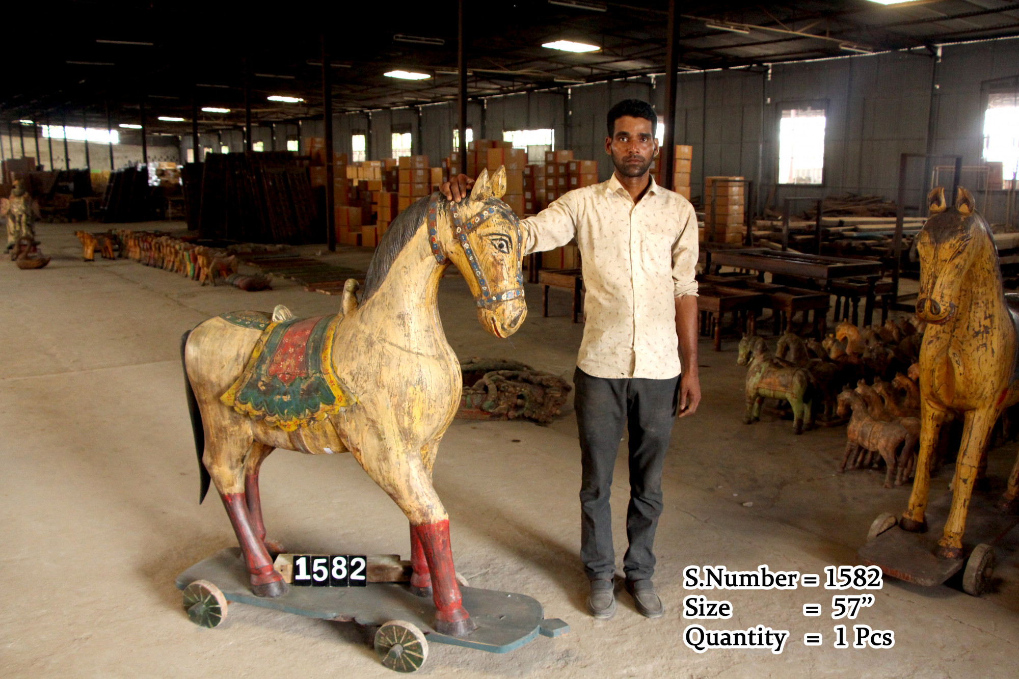 Vintage wooden horse onn wheels