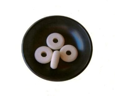BB15H-4 Felt Drum Beater Balls 1 12 dia x 12 thick x 12 hole all the way thru with curved radius