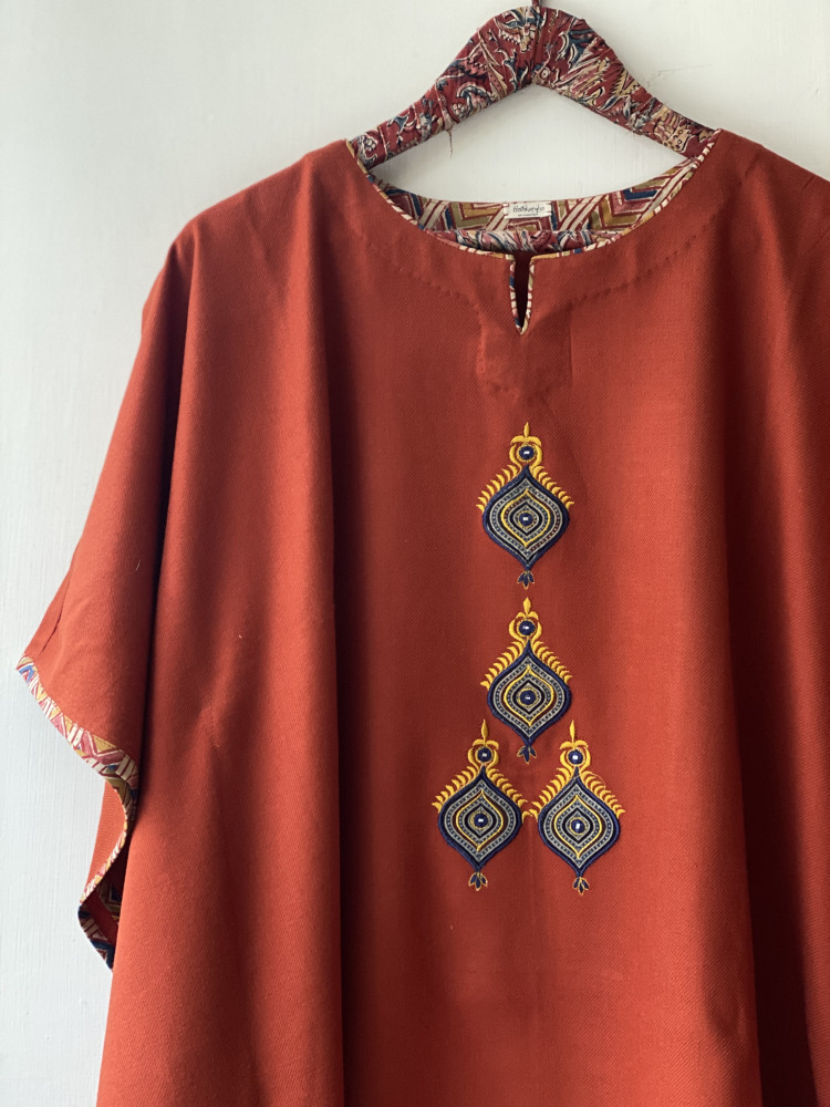 Image of RUST WOOLLEN EMBROIDERED KAFTAN