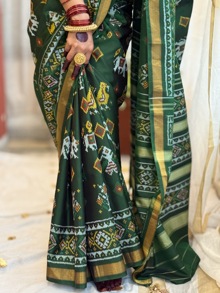 Image of BOTTLE GREEN SINGLE IKKAT PATOLA  HAND WOVEN SILK SARI