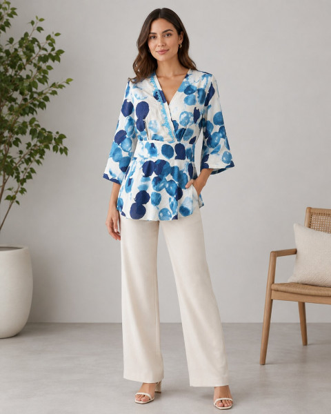 Image of Blue Abstract Print Wrap-Style Peplum Top