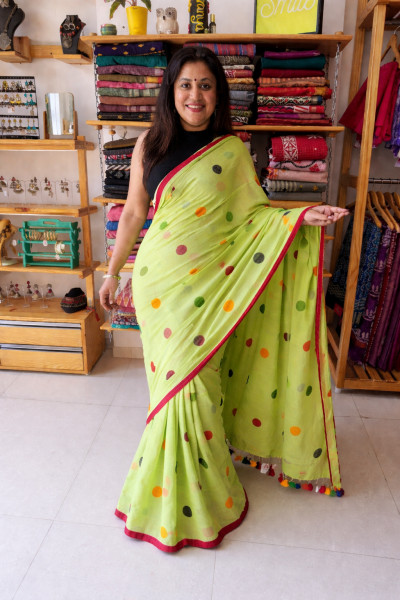 Polka Dots Green Saree with sleeveless Blouse