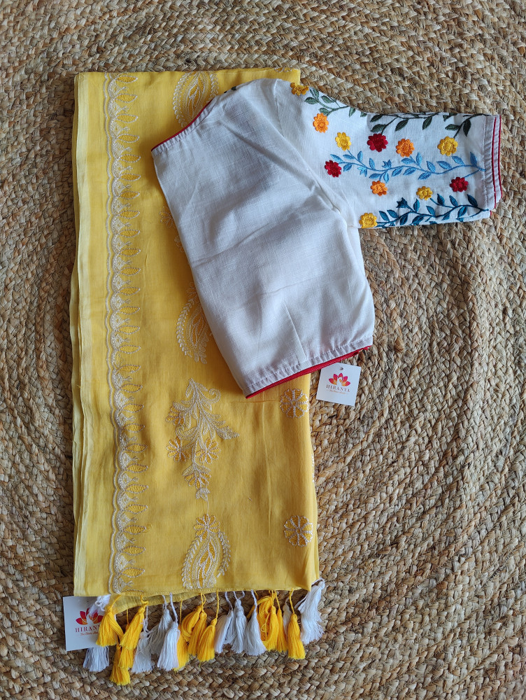 Image of Yellow Mul cotton saree with white embroidery Blouse