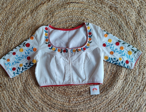 Yellow Mul cotton saree with white embroidery Blouse