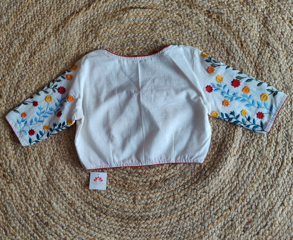 Yellow Mul cotton saree with white embroidery Blouse