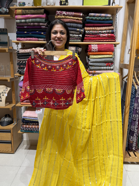 Yellow zari stripes saree with  Red Free Size blouse