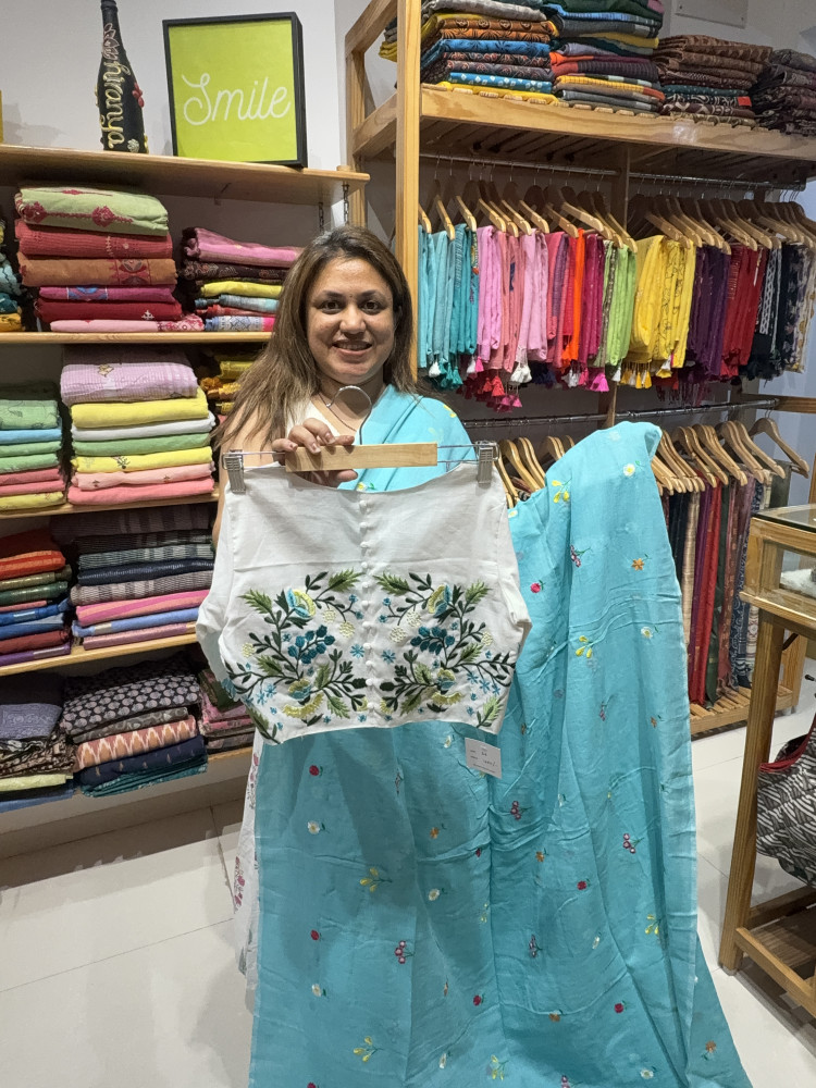 Image of Aqua Blue mul saree with bestseller blouse