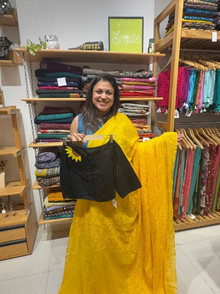 Yellow Chikankari Saree with Sunflower Blouse.