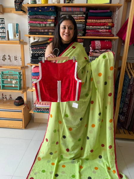 Polka Dots Green Saree with sleeveless Blouse
