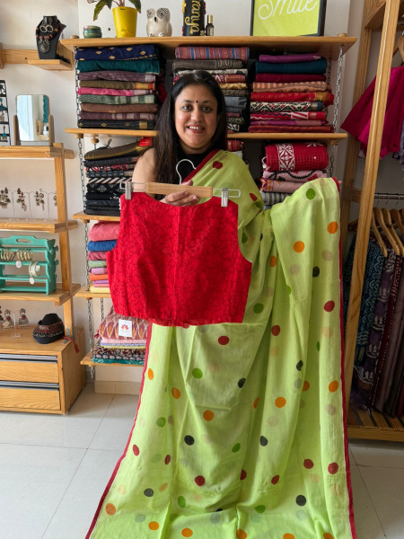 Polka Dots Green Saree with sleeveless Blouse