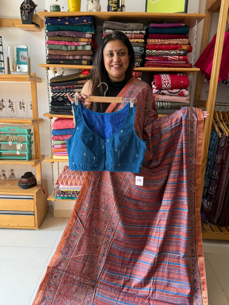 Image of Polka Dots mustard Saree with sleeveless Blouse
