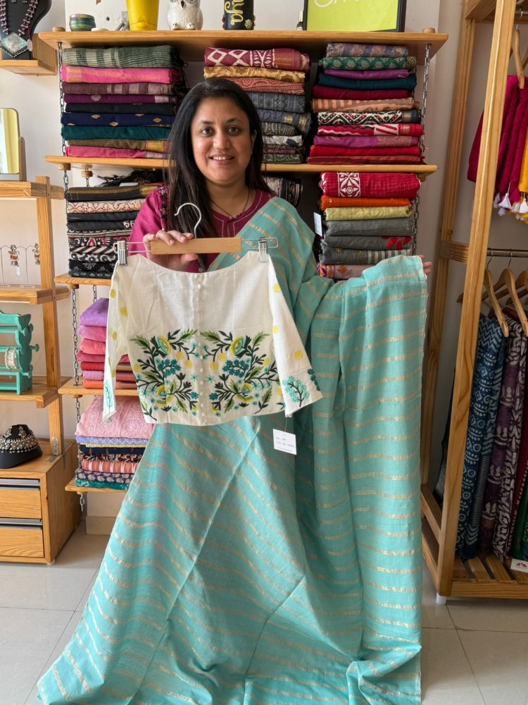 Image of Pure cotton Zari Stripes saree with white Embroidered Blouse