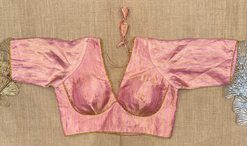 Image of Solid Sleeveless Tissue Saree Blouse with sleeves