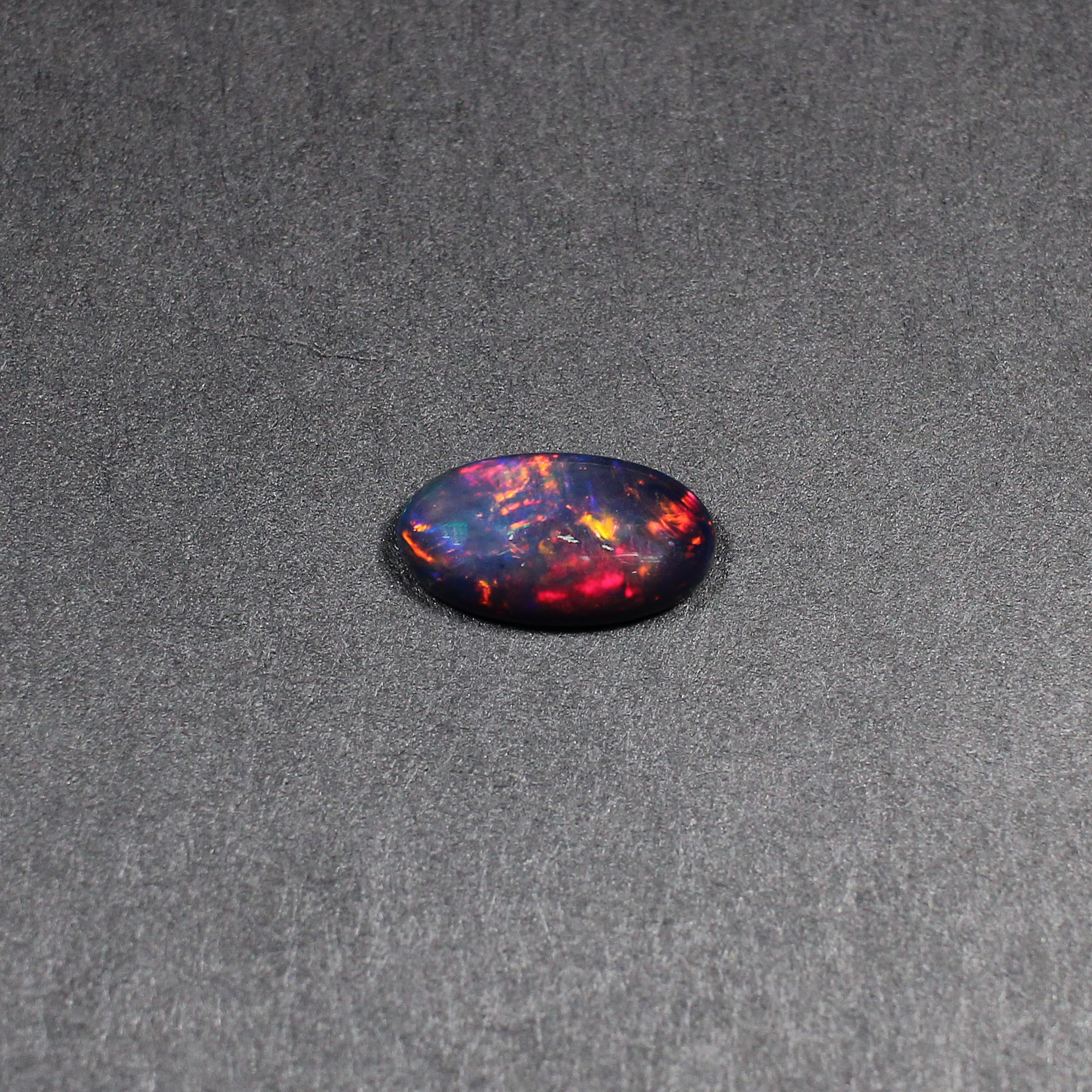 Natural Black Multi Fire Opal 9x6mm Oval Cabochon 115 Cts Gemstone For Making Jewelry