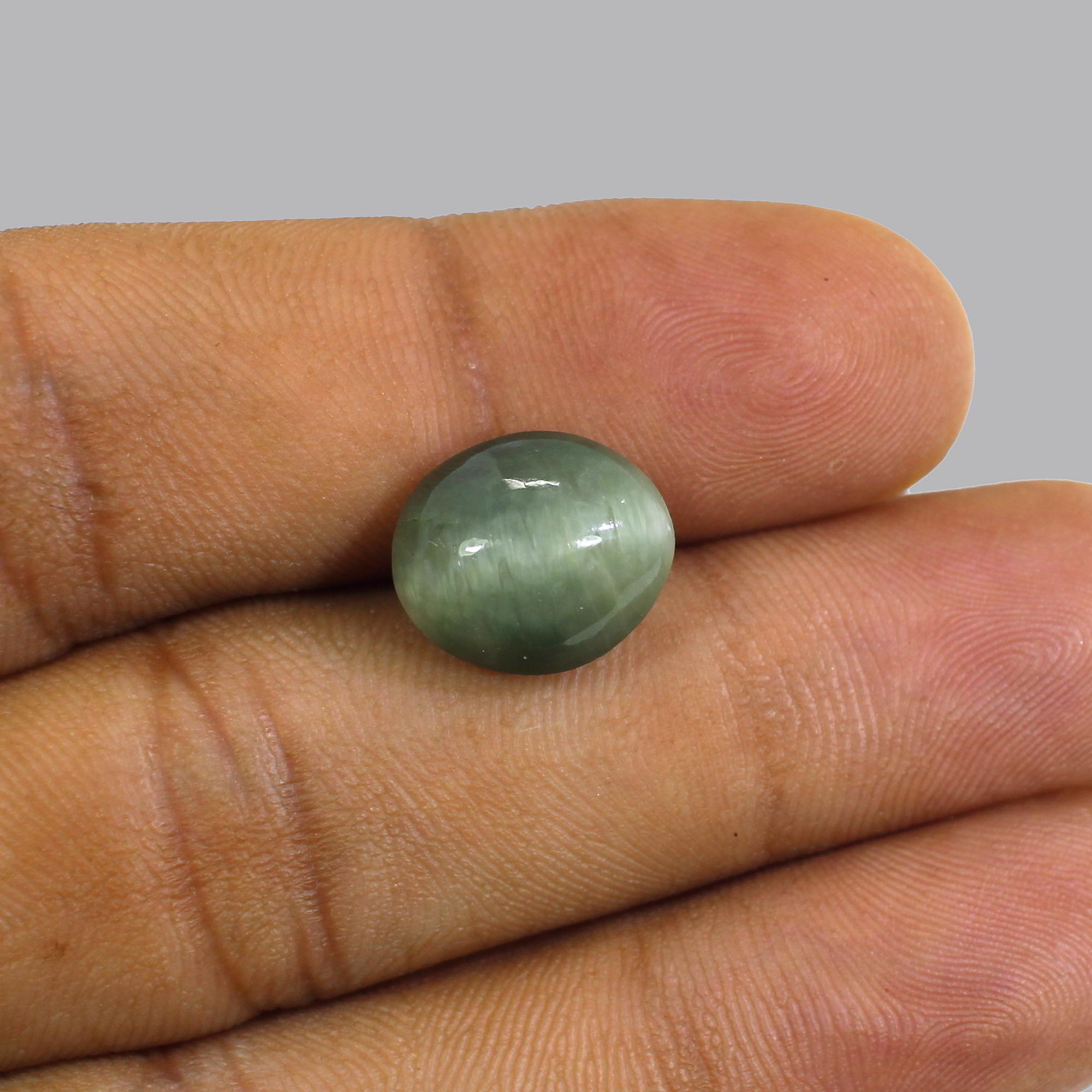 Natural Cats Eye 13x11mm Oval Cabochon 690 Cts
