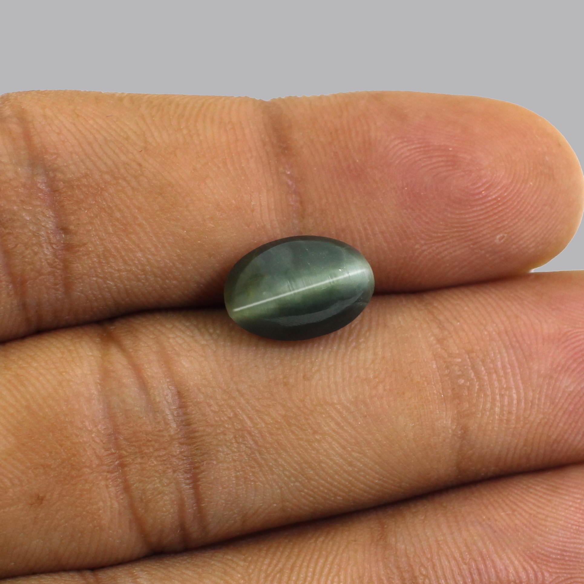 Natural Cats Eye 11x10mm Oval Cabochon 440 Cts