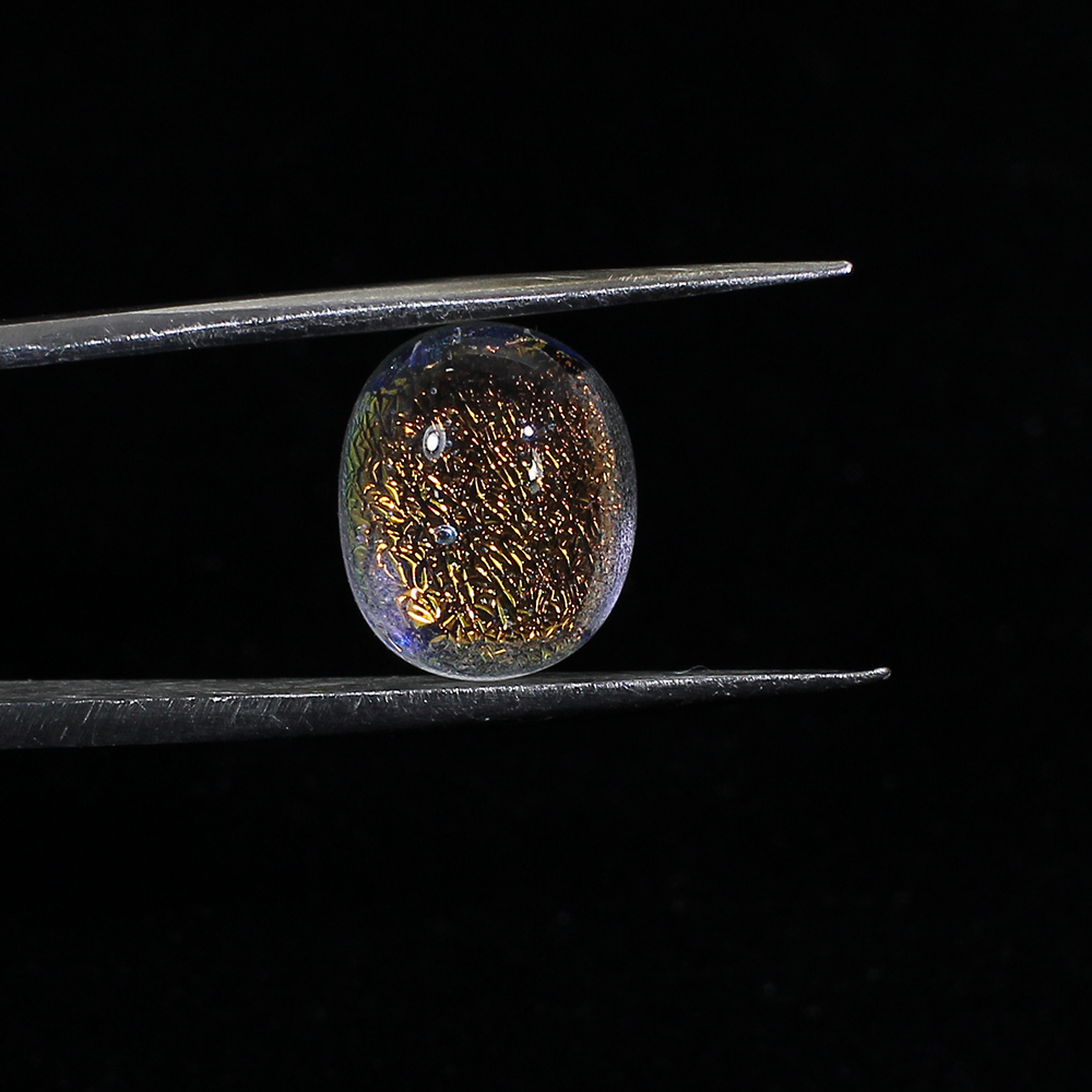 Synthetic Ethiopian Opal 10x9 Oval Cabochon 390 Cts