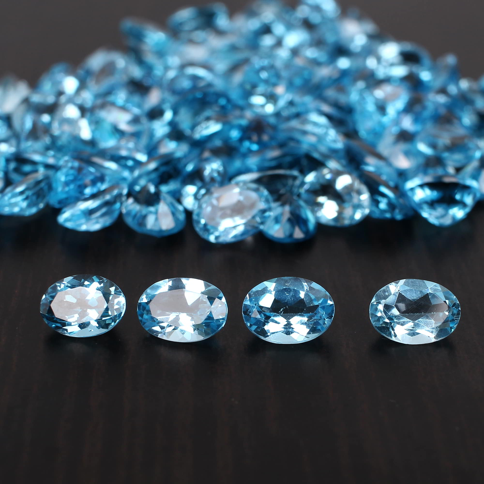 Natural Swiss Blue Topaz 7x5mm Oval Faceted Cut 115 Cts