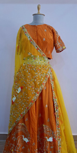ORANGE MUSTARD HEAVY WORK LEHNGA WITH HEAVY CUTWORK DUPPTTA