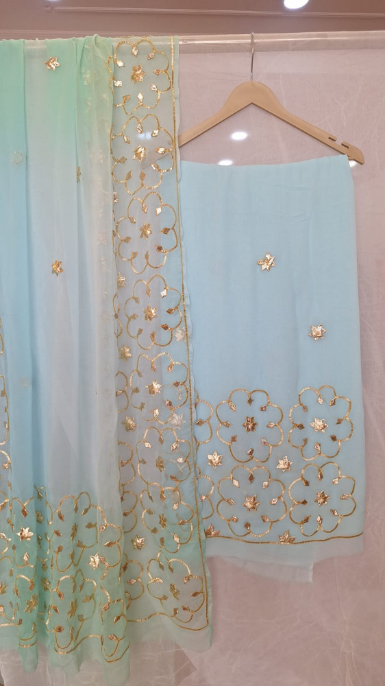 Image of AQUA BLUE GEORGETTE SUIT WITH SHIFFON KACCHAGOTA HANDWORK  AND SANTOON PANTS UNSTITCHED SET