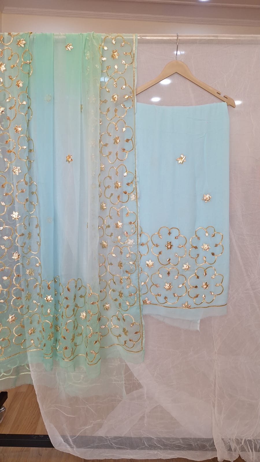 AQUA BLUE GEORGETTE SUIT WITH SHIFFON KACCHAGOTA HANDWORK AND SANTOON PANTS UNSTITCHED SET