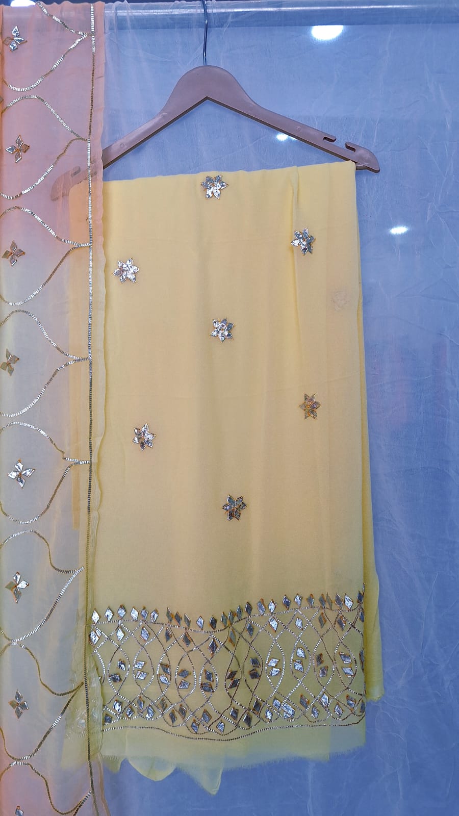 LIGHT YELLOW GEORGETTE SUIT WITH SHIFFON LIGHT YELLOW KESARI SHADED DUPPTTA AND SANTOONPANT UNSTITCHED