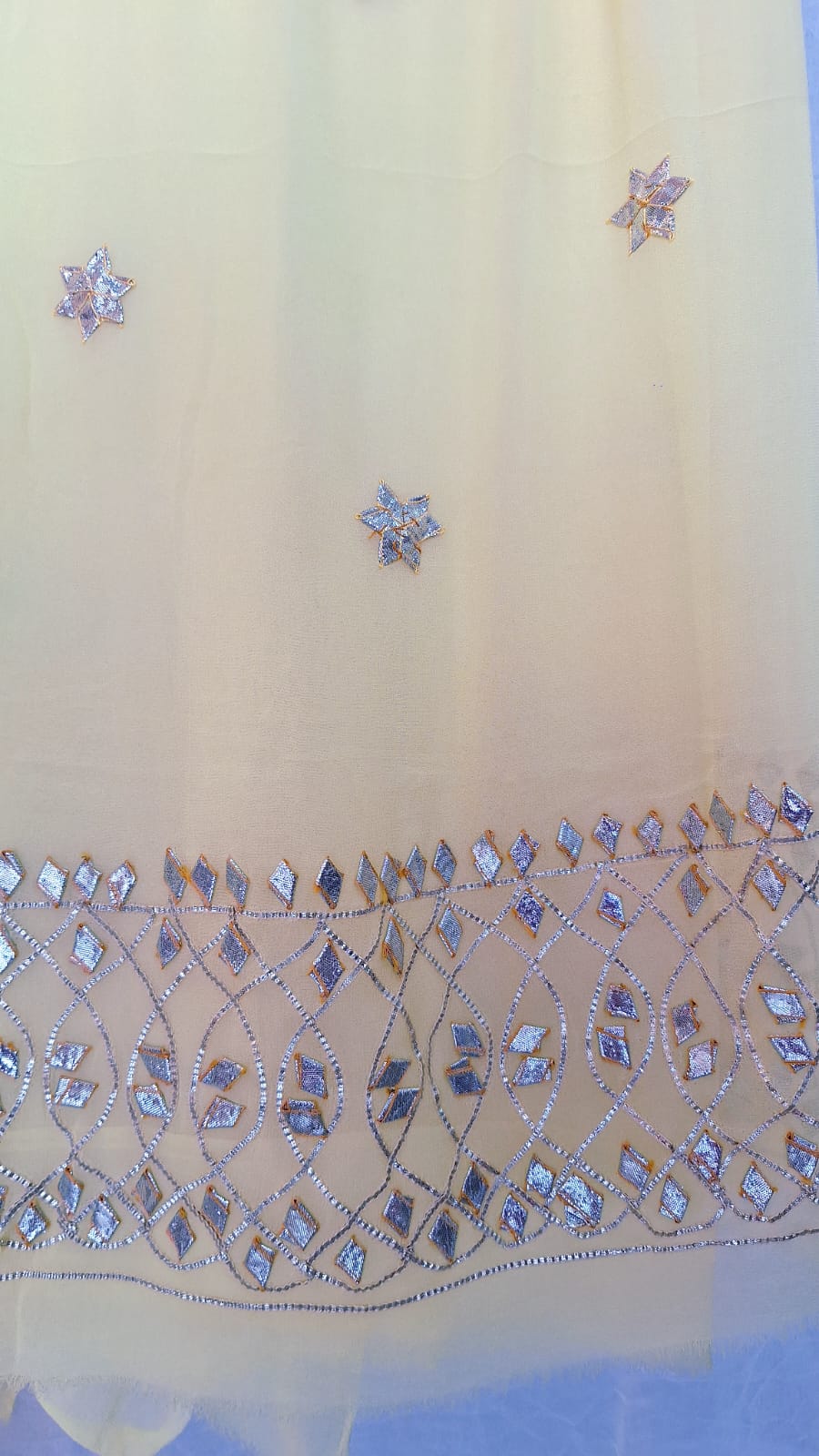 LIGHT YELLOW GEORGETTE SUIT WITH SHIFFON LIGHT YELLOW KESARI SHADED DUPPTTA AND SANTOONPANT UNSTITCHED