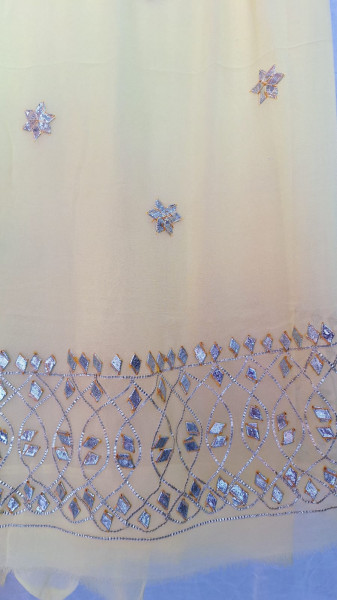 LIGHT YELLOW GEORGETTE SUIT WITH SHIFFON  LIGHT YELLOW KESARI SHADED DUPPTTA AND SANTOONPANT UNSTITCHED