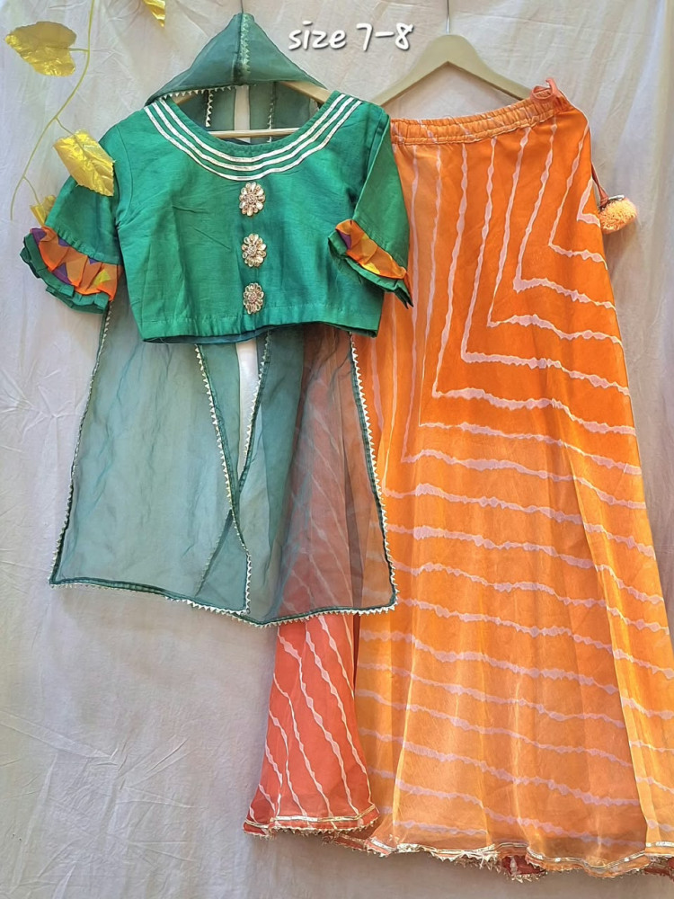 Image of GREEN TOP WITH SKIRT AND DUPPTTA SET
