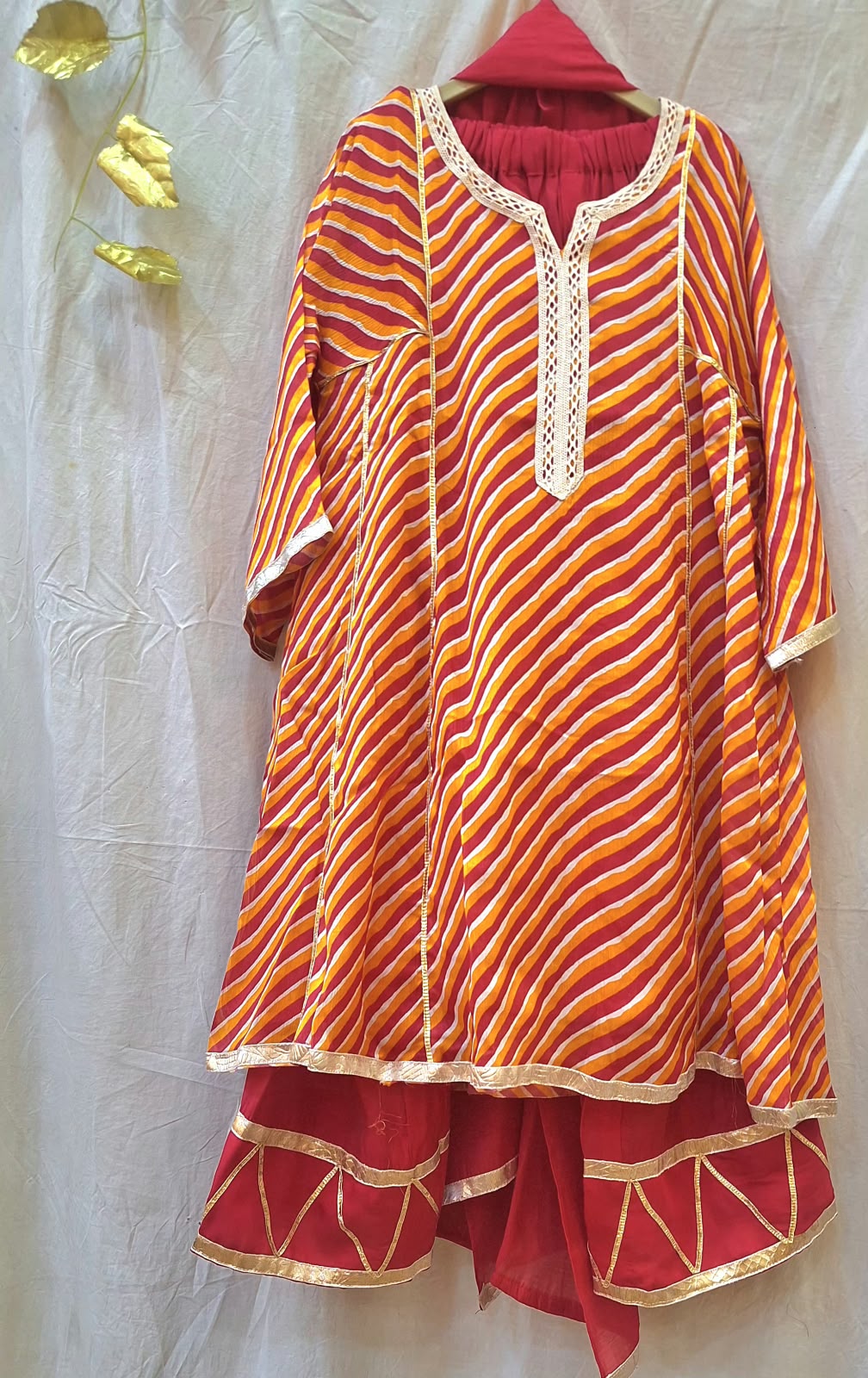 ORANGE LEHRIYA TOP WITH RED MUL PANT AND DUPPTTA SET