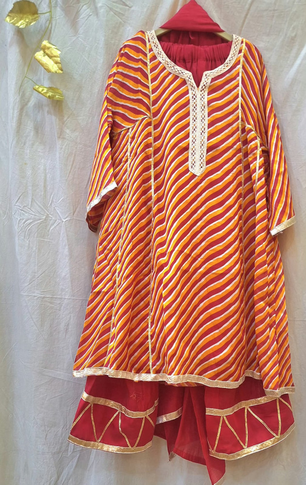Image of ORANGE LEHRIYA TOP WITH RED MUL PANT AND DUPPTTA SET
